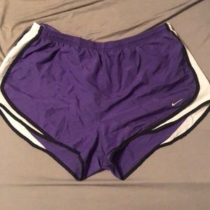 Purple Nike shorts with white and black trim. XL.